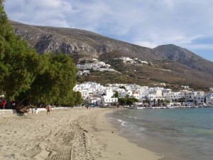 The beach with the port of Ormos and the village of Potamos above